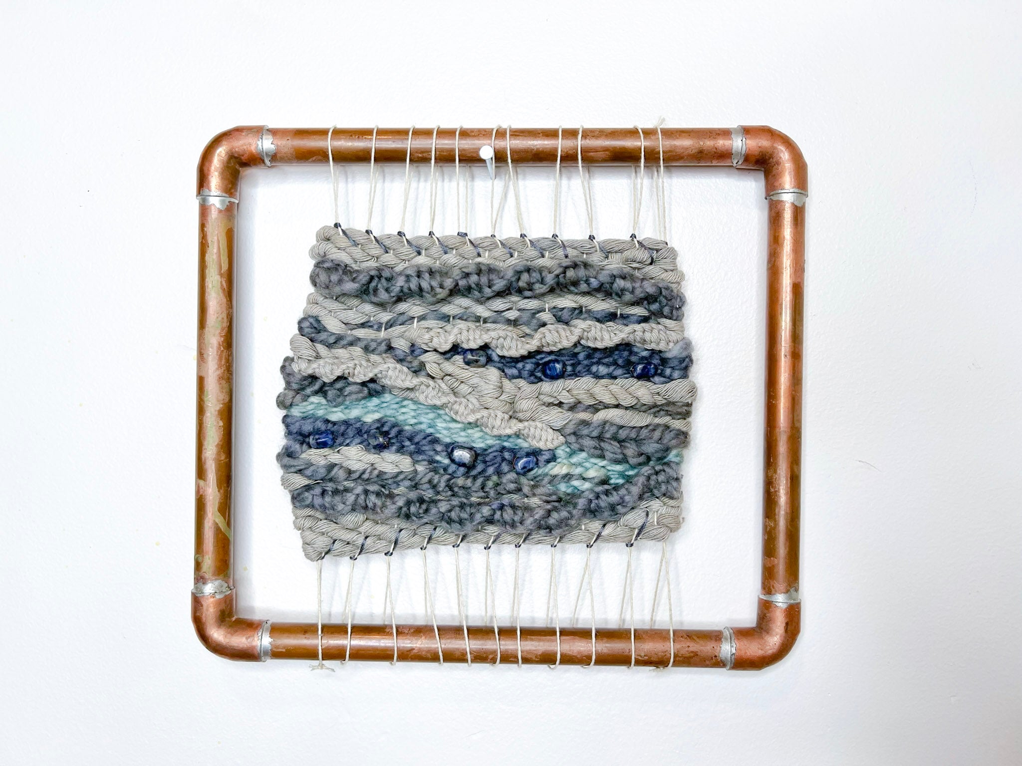 Naturally Dyed ancient Logwood and Indigo Woven Wall Hanging Tapestry with seven sodalite crystal beads in a custom copper frame from small woman owned business 